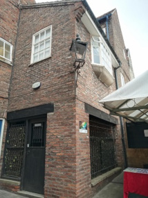 A photo of the entrance from the street, on Newgate