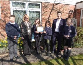 Headteacher Luke Dancer with Emma Wooldridge, SENCO, Cllr Bob Webb, and pupils from Copmanthorpe Primary School.