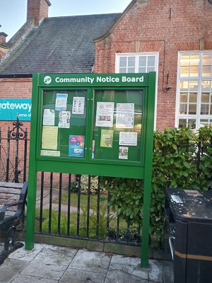 The new Community Notice board, which has been painted green, stood in front of the Gateway Centre