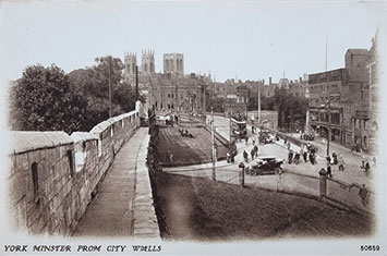 Old postcard in black and white showing York Minster from the City Walls.